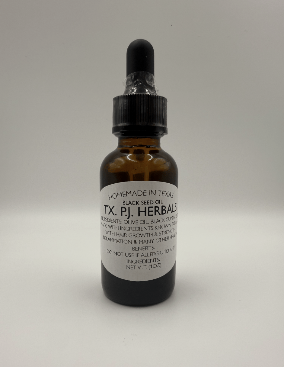Brown glass dropper bottle of black seed oil for skin, hair, and digestive support by TX P.J. Herbals