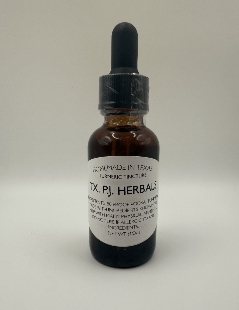 Bottle of homemade turmeric tincture by TX Pl Herbals with dropper for anti-inflammatory and joint health support