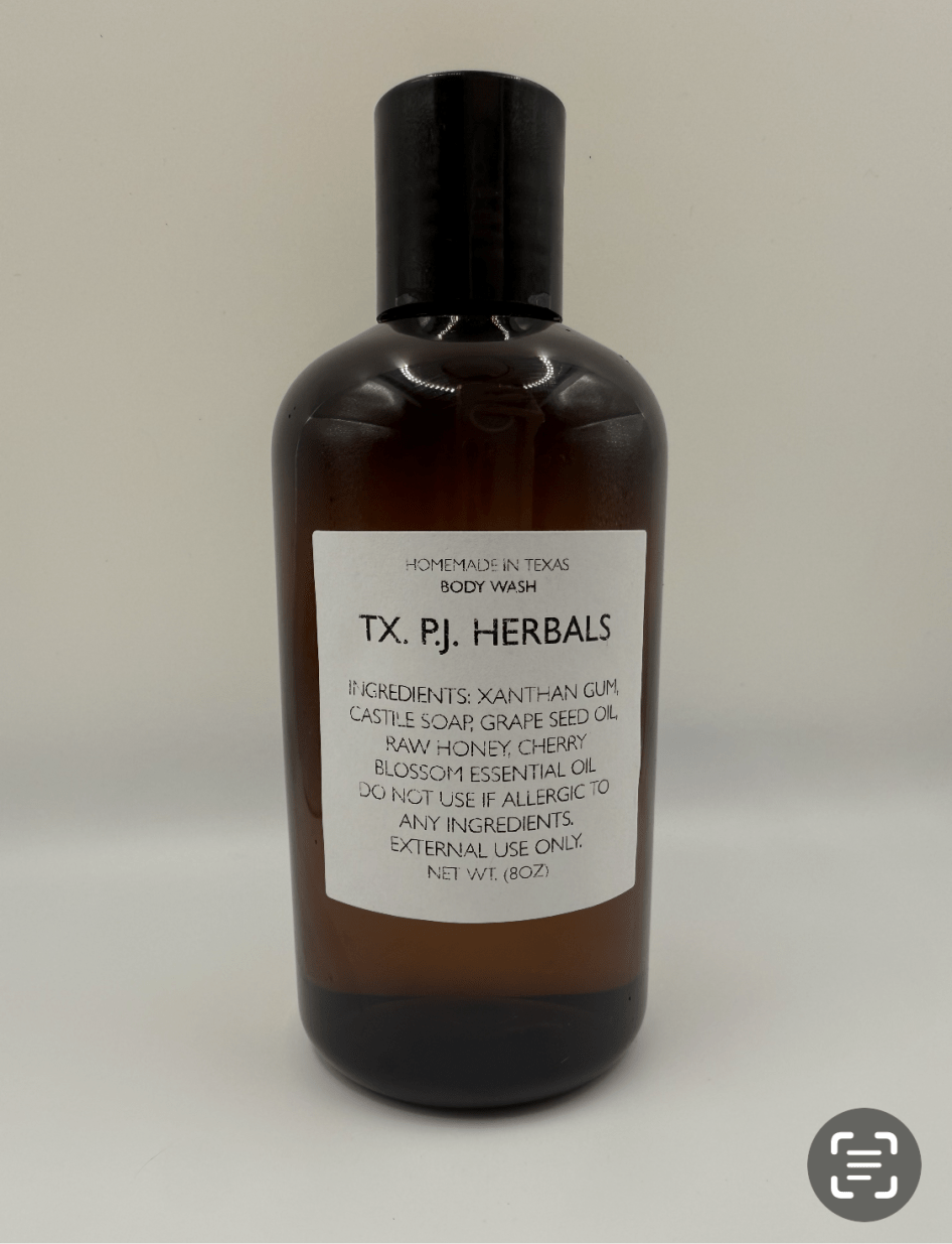 8 oz brown bottle of all-natural body wash with organic ingredients label from TX. PJ. Herbals