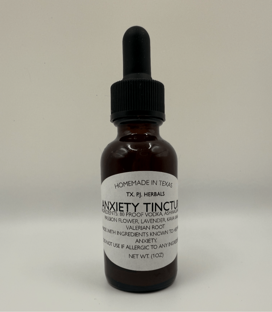 Brown glass bottle of Anxiety Herbal Tincture with dropper and white label showing ingredients, homemade in Texas.