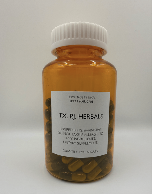 Amber bottle of Bhringraj Powder Capsules by TX. PJ. Herbals for scalp and hair care with white label and white cap