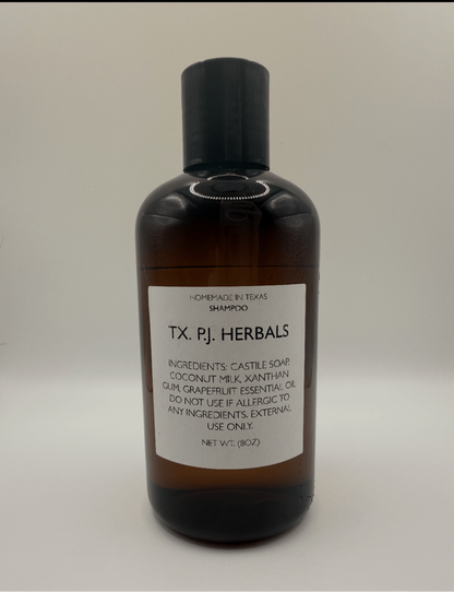 8 oz bottle of all-natural shampoo with pure ingredients, no added chemicals, labeled TX PJ Herbals, nourishing and moisturizing hair.