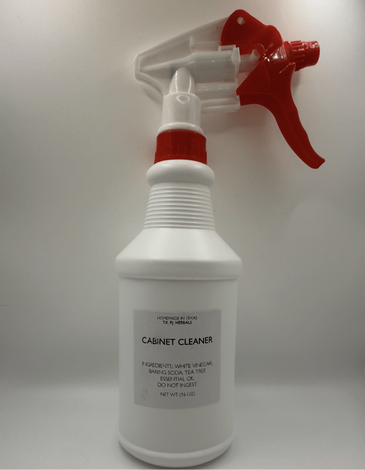 Eco-Friendly Cabinet Cleaner spray bottle with red nozzle made from natural ingredients like vinegar and baking soda