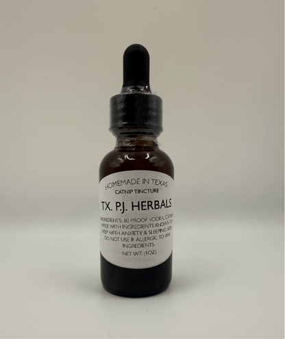 Brown glass bottle of organic Catnip Tincture with dropper, labeled homemade in Texas by TX. P.J. Herbals, natural remedy for anxiety and sleep support.