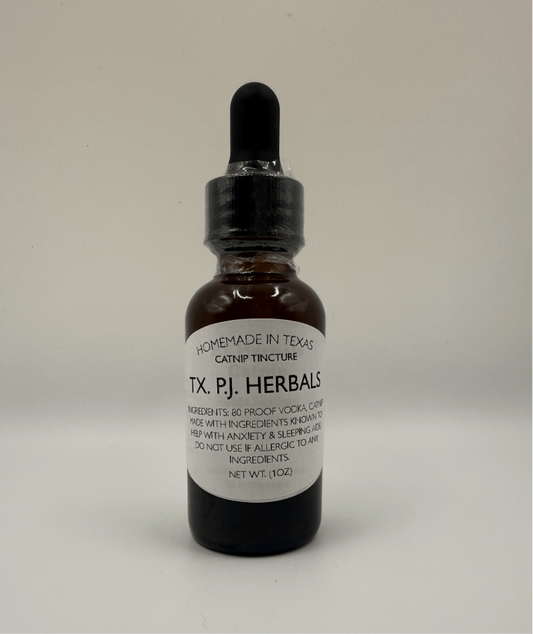 Brown glass bottle of organic Catnip Tincture with dropper, labeled homemade in Texas by TX. P.J. Herbals, natural remedy for anxiety and sleep support.