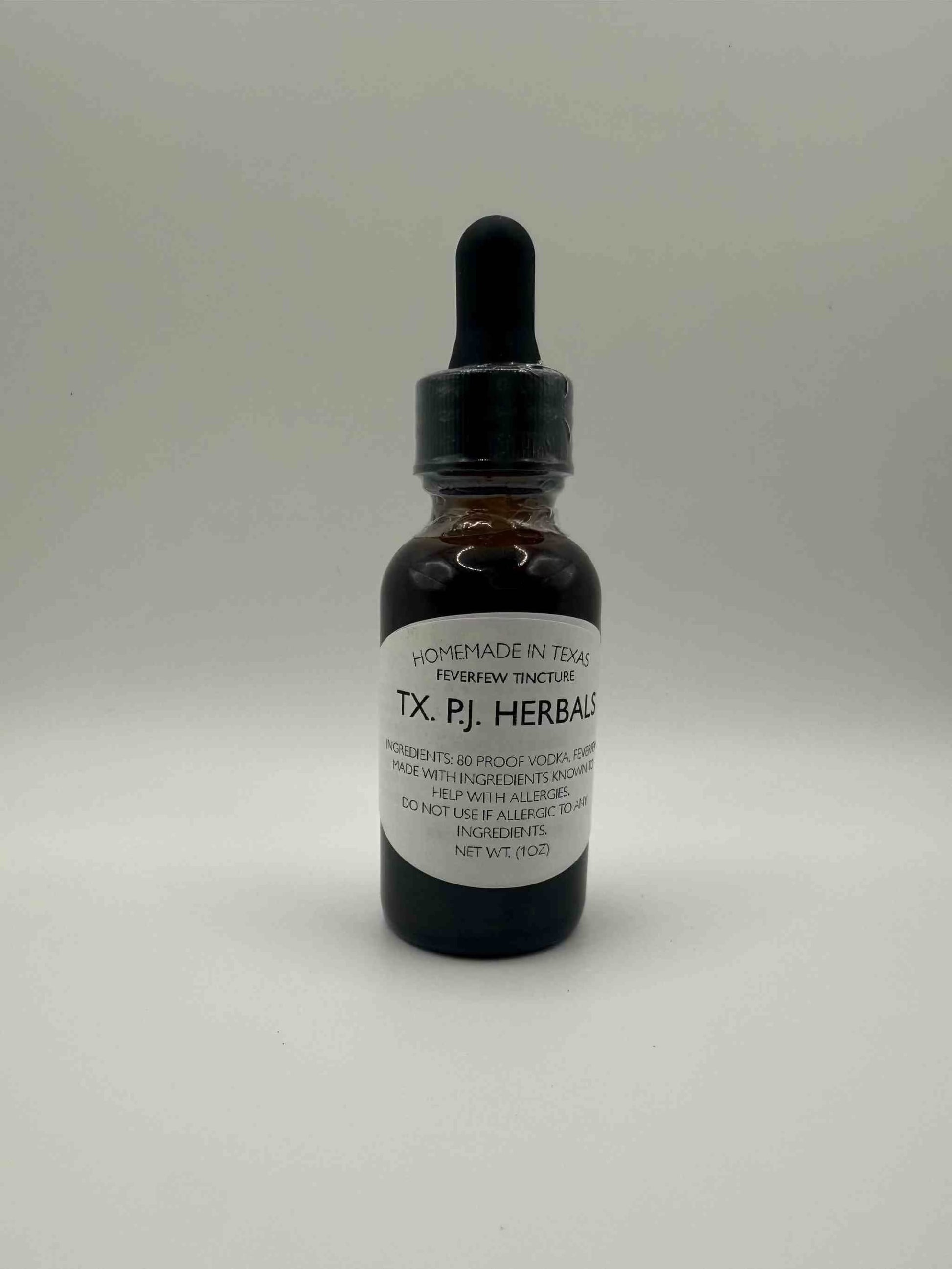 Organic Feverfew Tincture in a dark glass dropper bottle for natural migraine relief