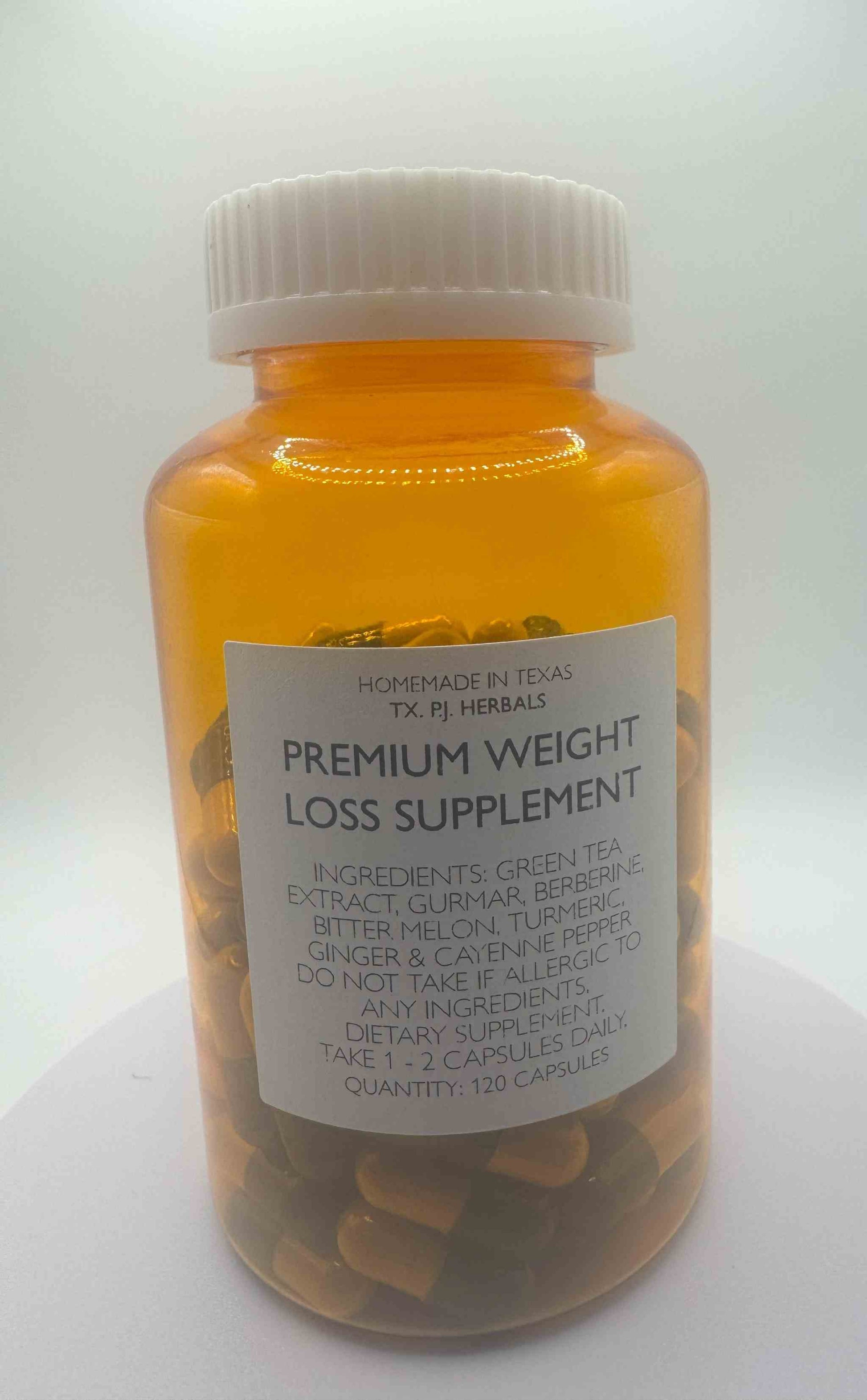 Bottle of Organic Weight Loss Supplement capsules with natural herb ingredients for metabolism and appetite control