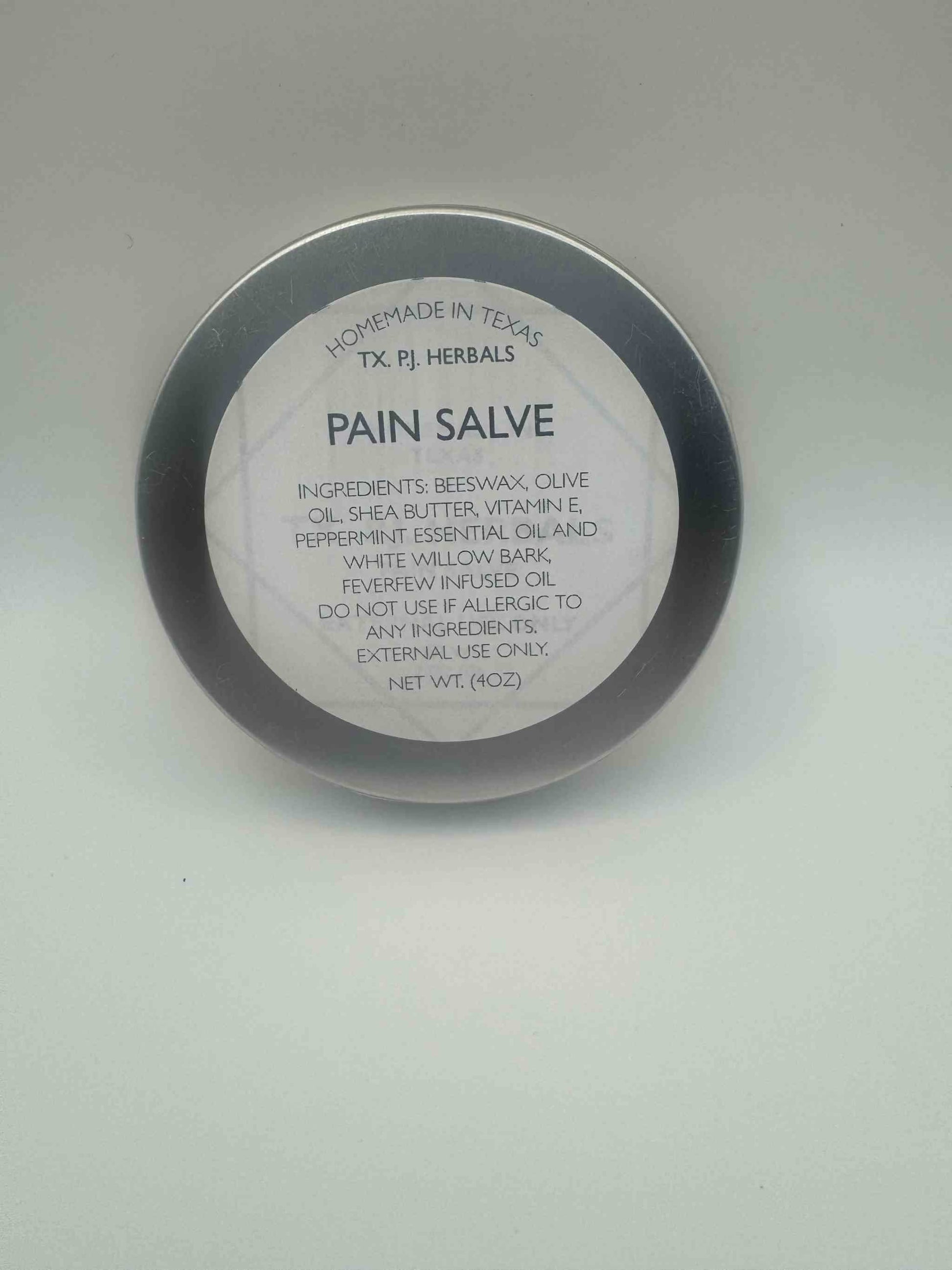 All-Natural Herbal Pain Relief Salve in a round container with natural ingredient label