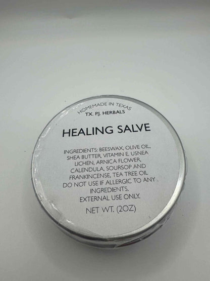 Organic Healing Salve tin with natural ingredients for soothing and healing skin.