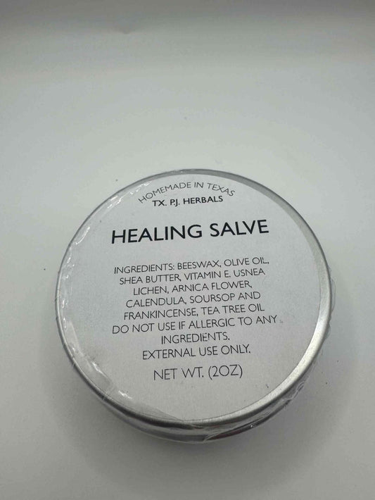 Organic Healing Salve tin with natural ingredients for soothing and healing skin.