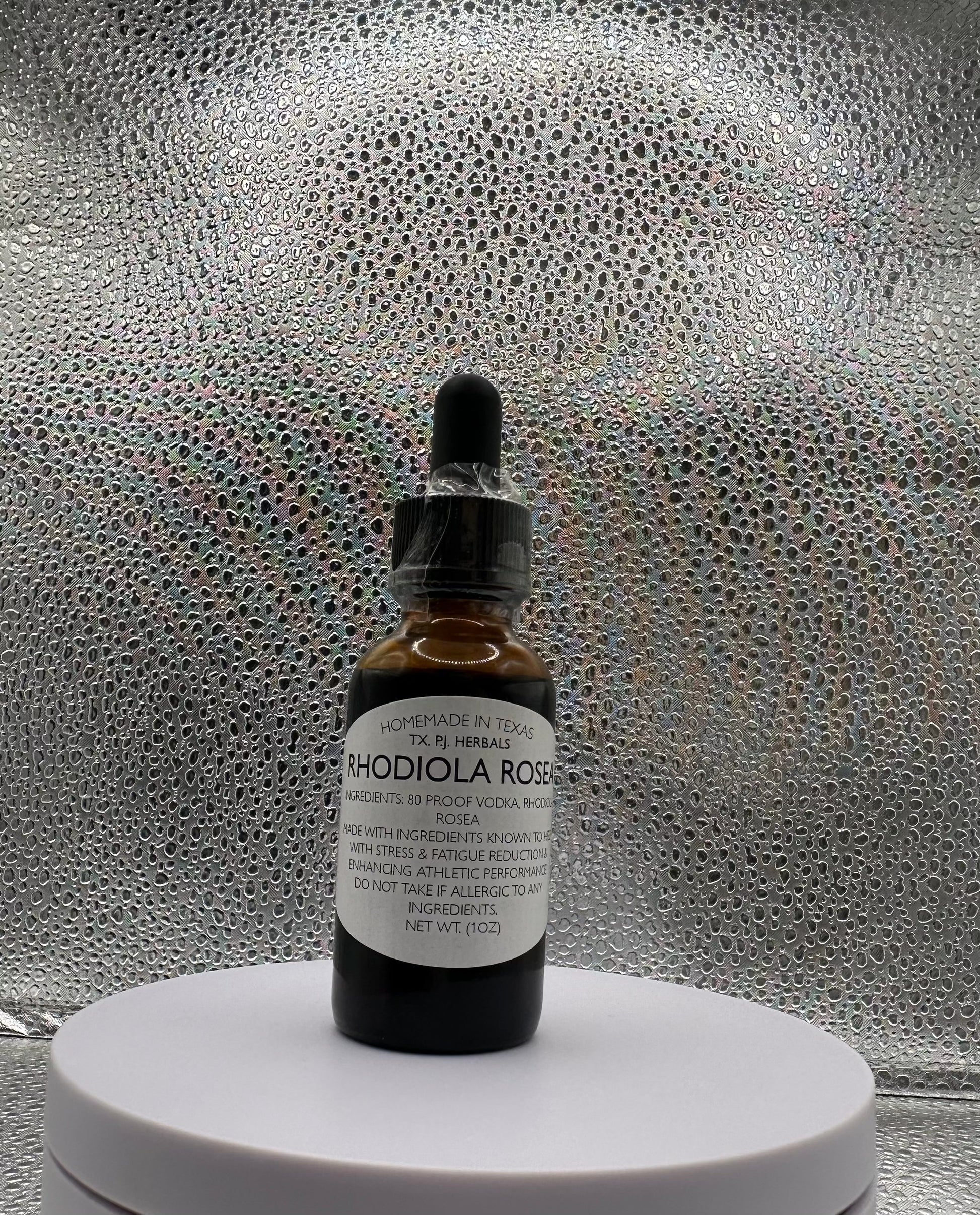 Bottle of All-Natural Rhodiola Rosea Tincture with herbal ingredients for stress relief and mental clarity